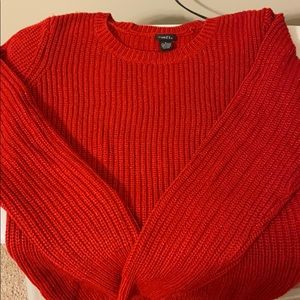 long, red, sparkly sweater